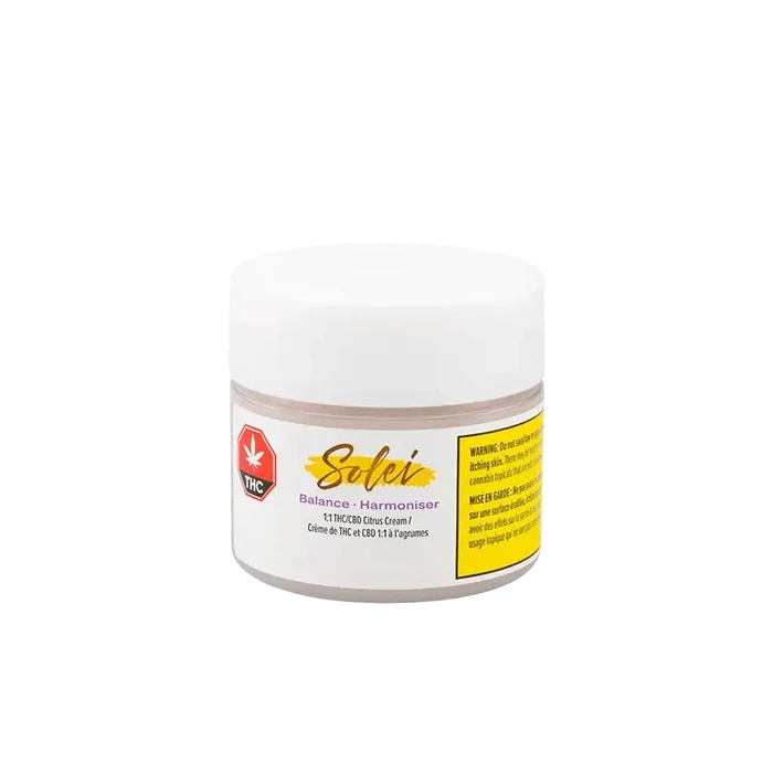 Close-up of the Balance Body Cream container, featuring a white label with black text, against a plain white background.