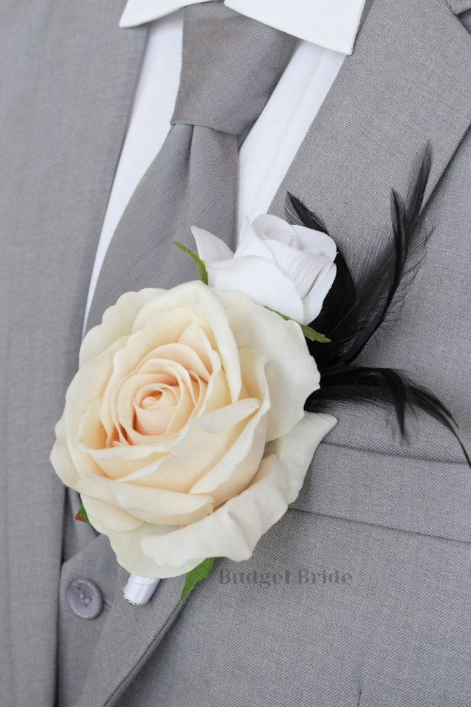 White and champagne ivory rose boutonniere with black feathers