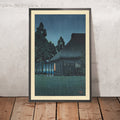 A framed image of Evening Rain at a Lakeside Tearoom by Hasui Kawase 1935