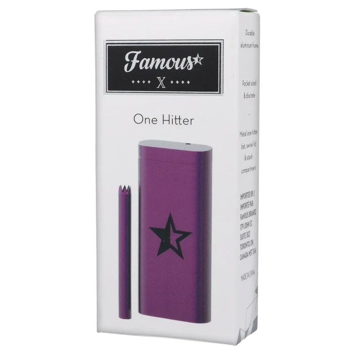 Angled front shot of the purple Famous X Aluminum Dugout - Purple showing the cylindrical dugout and matching bat with a black star on white packaging.
