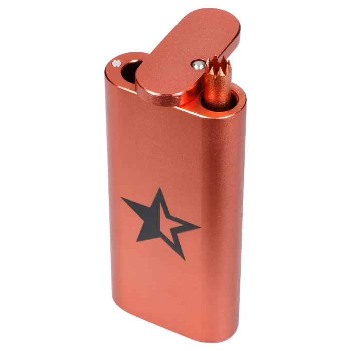 Angled close-up of the Famous X Aluminum Dugout - Rose Gold showing its flip-top, star logo, and textured rose-gold finish.