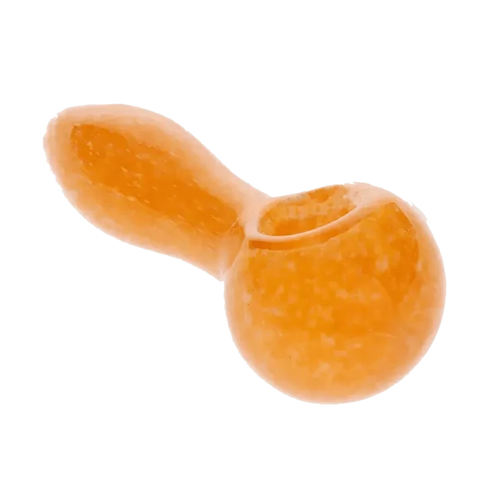 A speckled, spoon-shaped Frit Speckled Spoon Pipe - Assorted, captured in a close-up, angled shot against a plain white background.