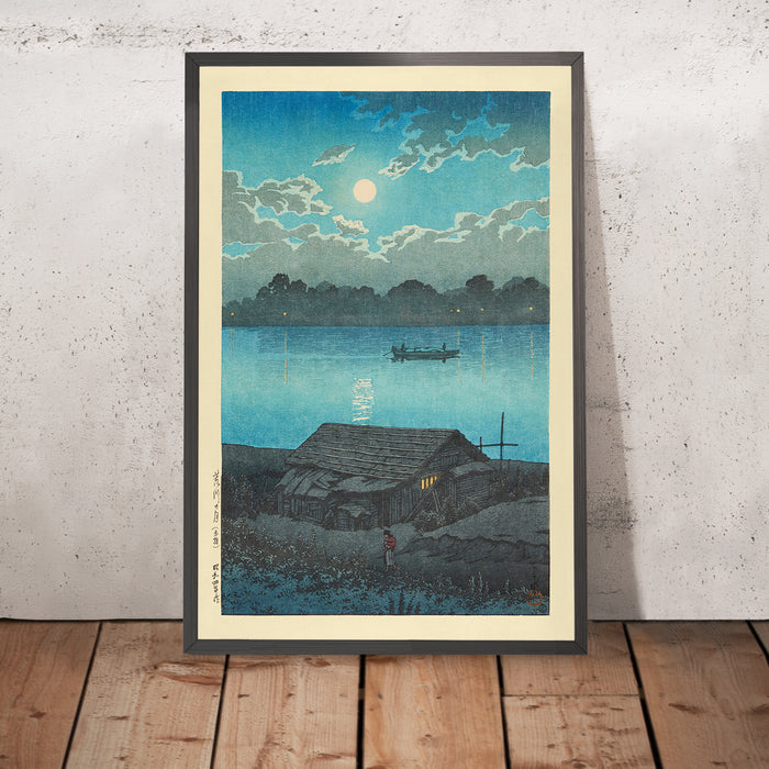 A framed image of Moon on the Arakawa River in Akabane by Hasui Kawase, 1935