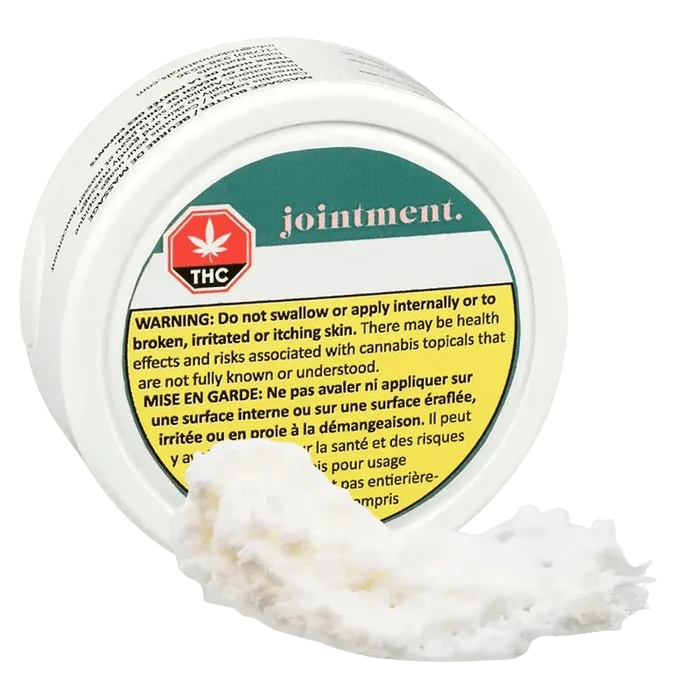 Close-up of the Jointoint packaging with a warning message in French, featuring a green and white design.
