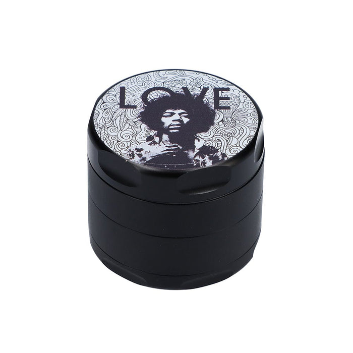 A close-up, top-down view of the black Rock Legends Jimmy-Love Grinder, showcasing its circular design with detailed engravings.