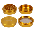 A top-down view of the gold Sackville and Co 4pc Grinder, showcasing its four-piece construction and metallic sheen.