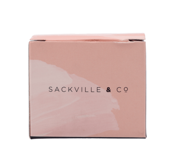 Front view of the Sackville and Co 4pc Grinder-Gold, showcasing its metallic finish against a plain background.