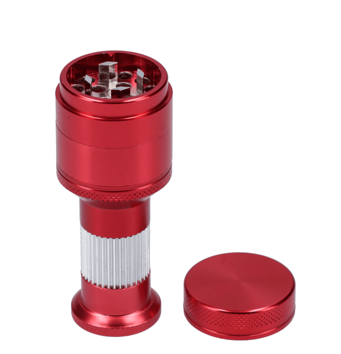 A top-down view of the 62mm Valiant Aluminum Grinder withPollen Press, showing its cylindrical shape and metallic finish against a plain white background.