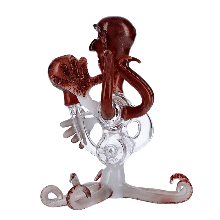 A three-quarter view of the Valiant Area 51 Frit Glass Recycler Dab Rig, featuring colorful frit patterns on clear glass.